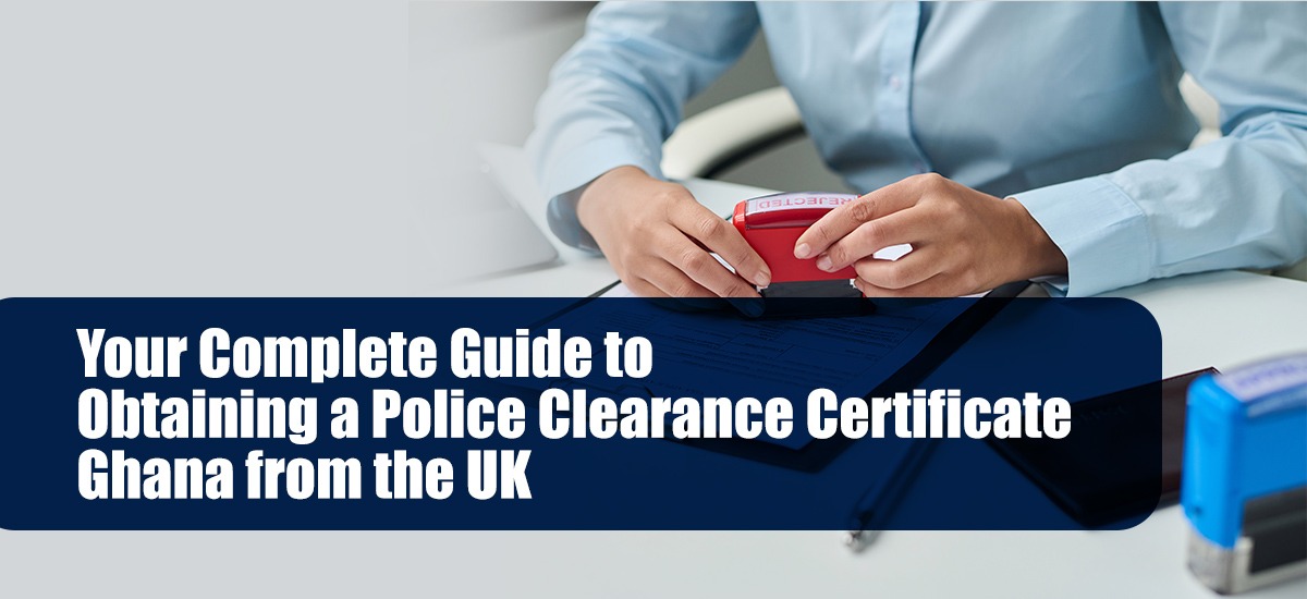 Image of a professional workspace featuring a person using a red stamp on a document, emphasizing the process of obtaining a Police Clearance Certificate from Ghana while residing in the UK. The guide highlights essential steps for expatriates, ensuring clarity and accuracy in meeting legal requirements.
